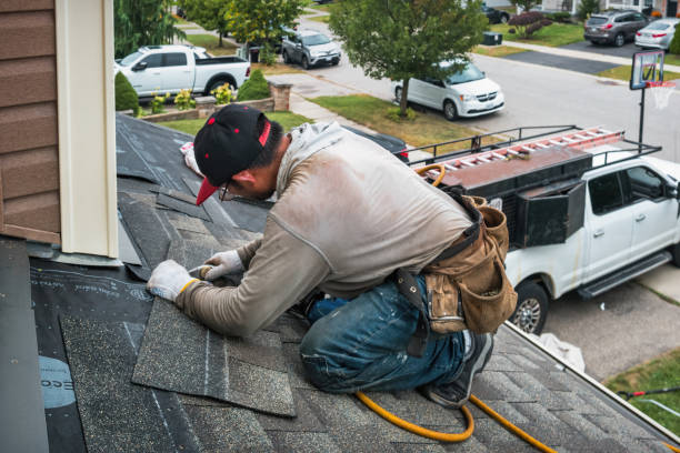 Professional Roof Replacement technician working in Welda, KS
